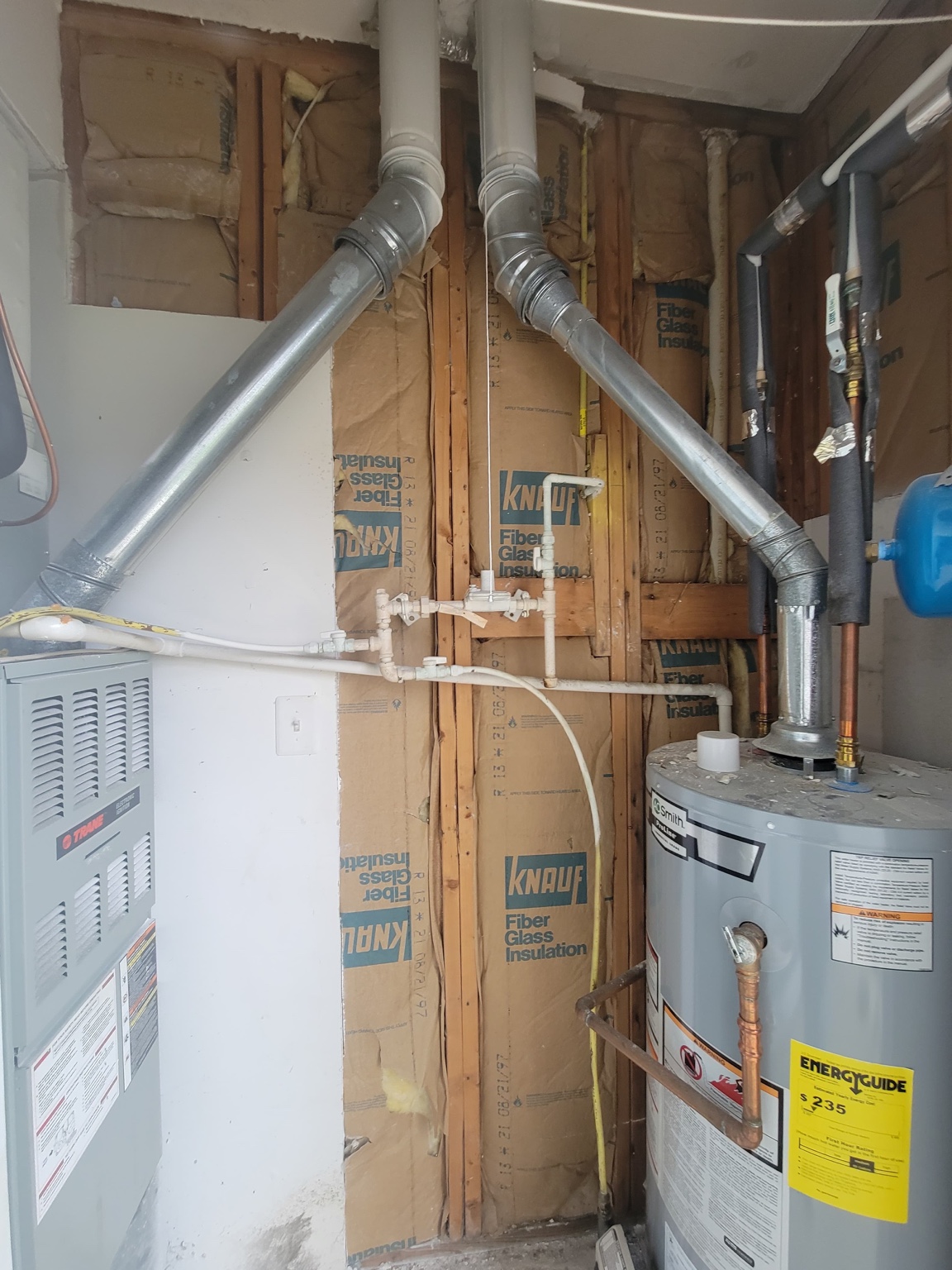 Mechanical room open wall before drywall repair